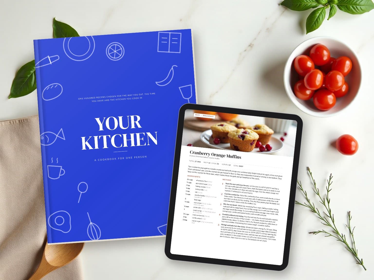 The cookbook printed, and open on a tablet